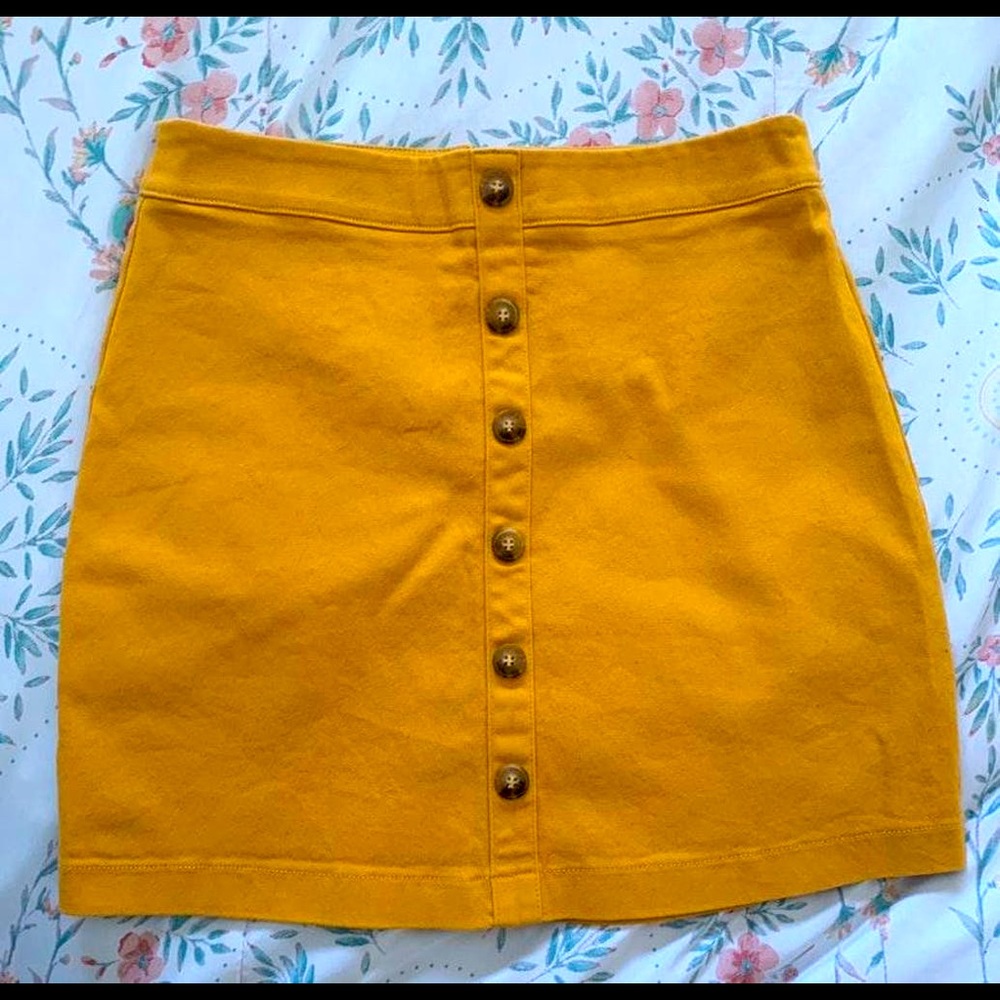 Bright Yellow short skirt .